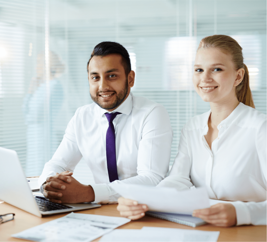 two fractional cro sitting at desks