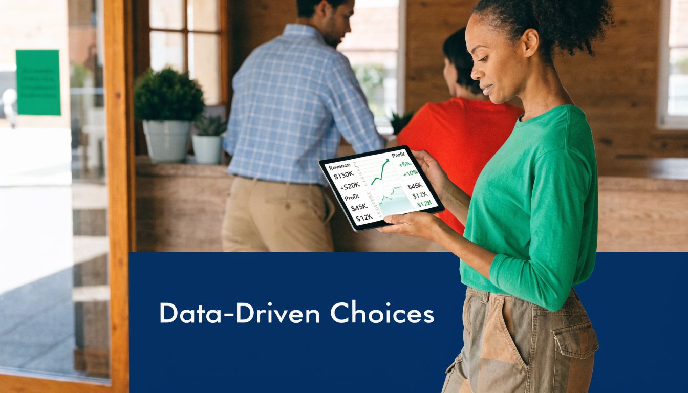 A woman holding a digital tablet displaying business growth charts in a modern office environment.